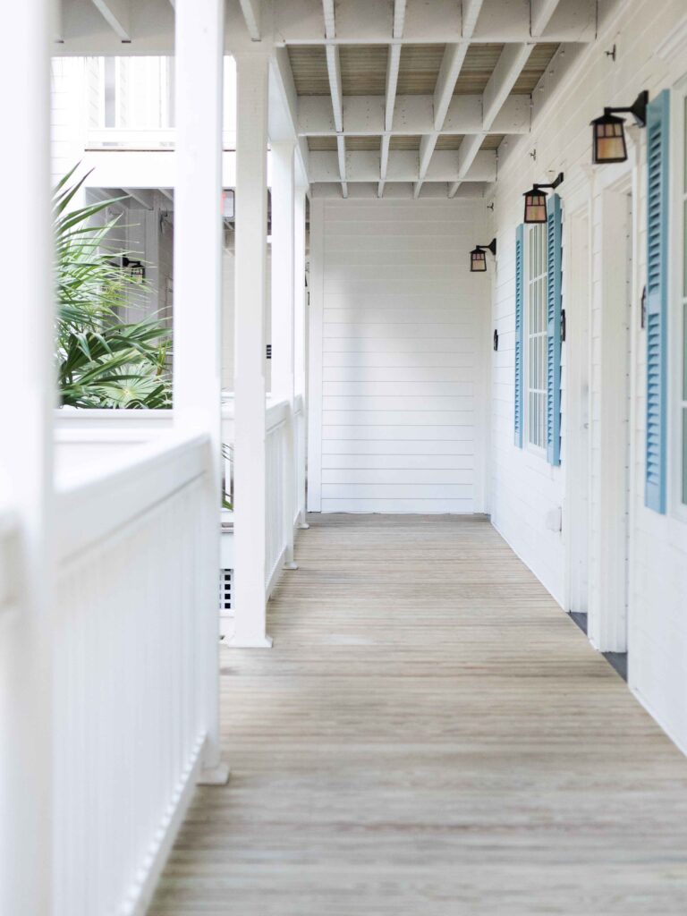 Modern white timber hampton timber style home balcony verandah porch outdoors holiday airy outdoors